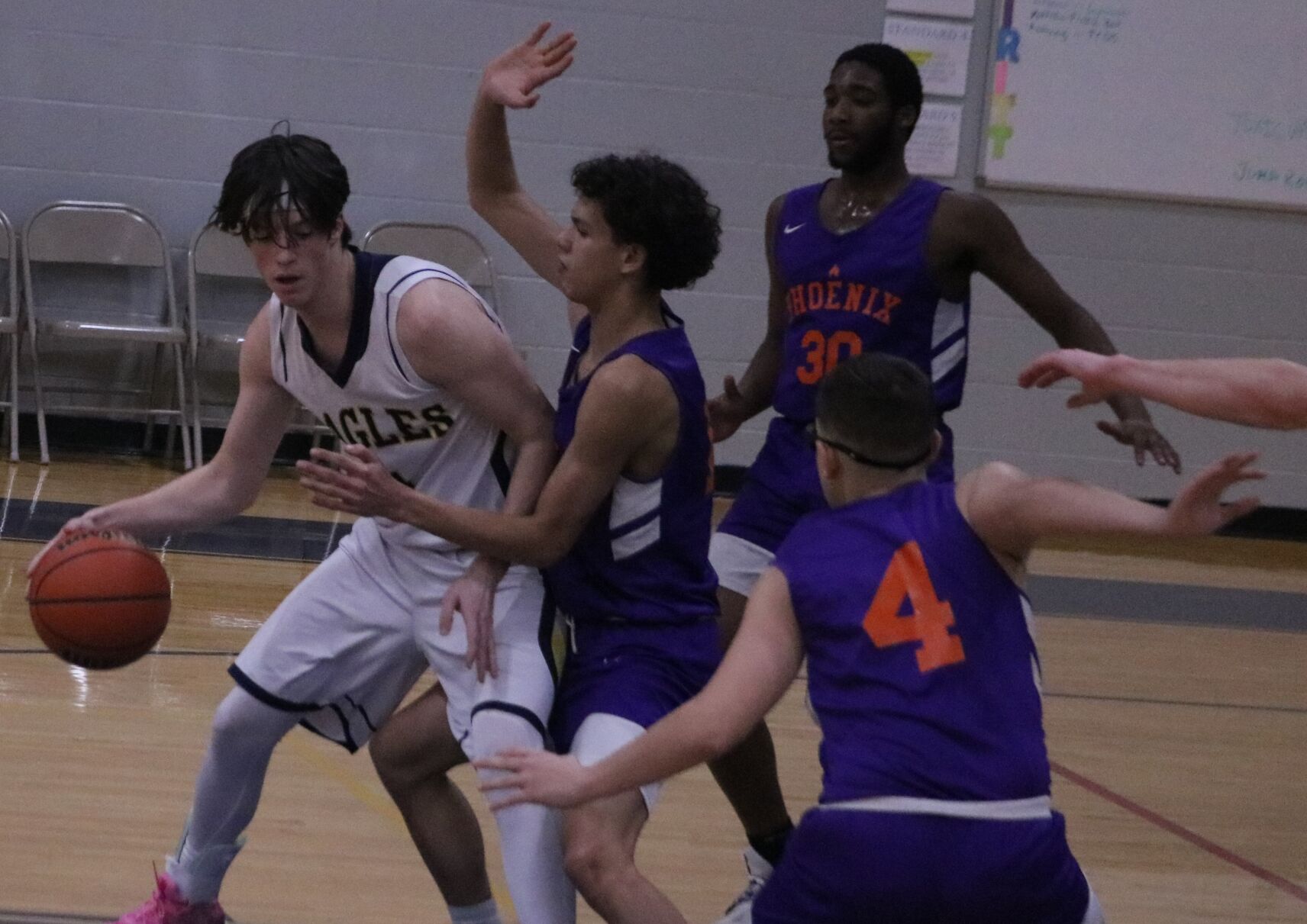 Justin Foster dribbles